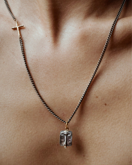 Ego Pendant on a Cross Chain